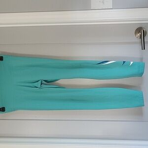 Stylish Teal Leggings with White and Blue Accents